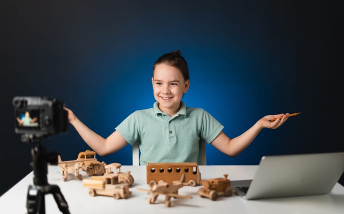 Young kid on video camera